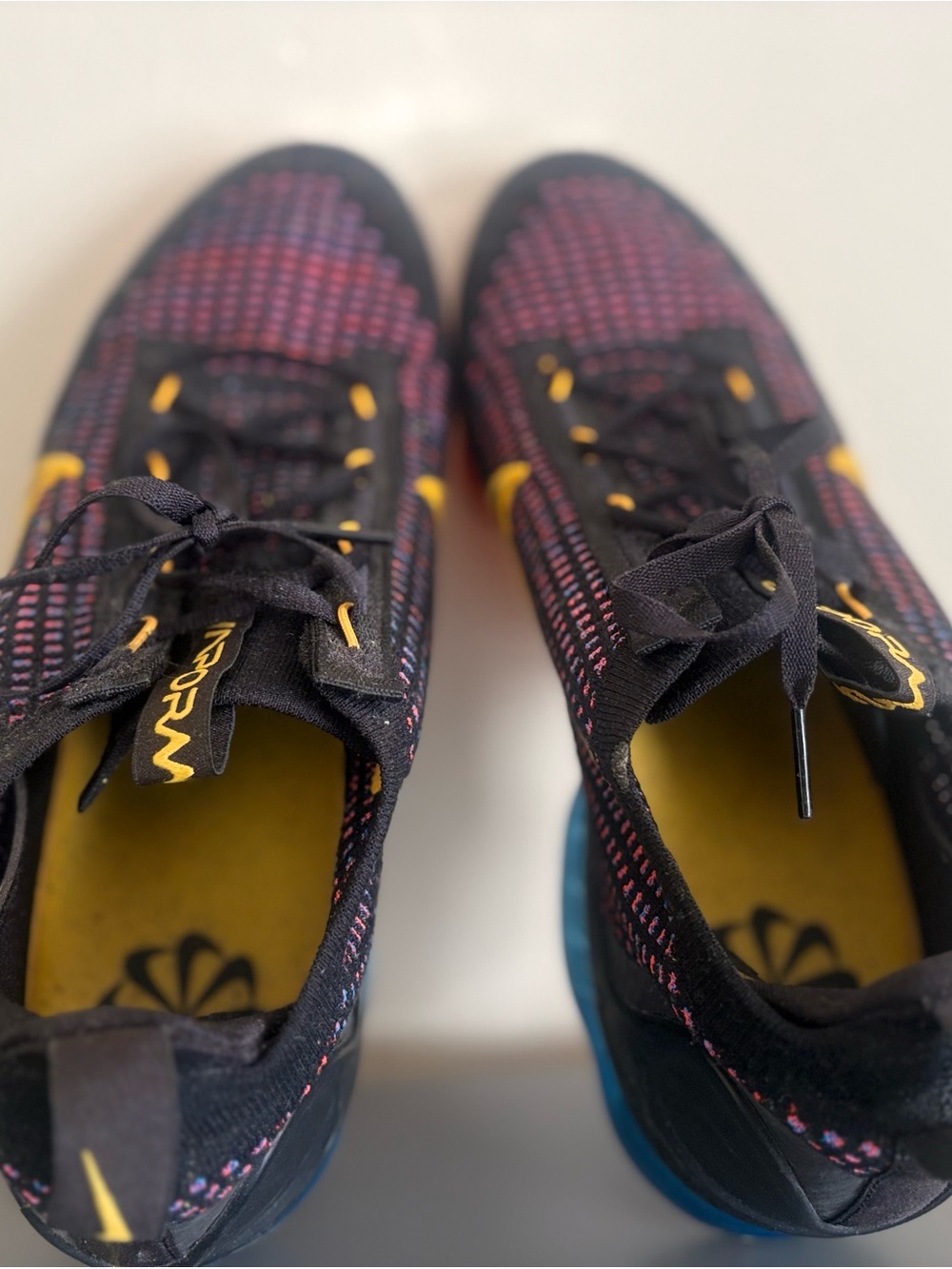 Nike Men's Black Knit Athletic Shoes with Pink and Yellow Accents